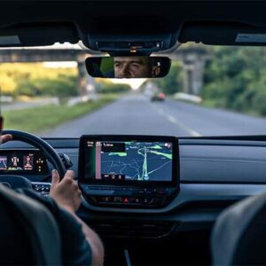 man-touching-screen-gps-navigation-system-his-car